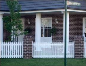 Face brick piers with pickets